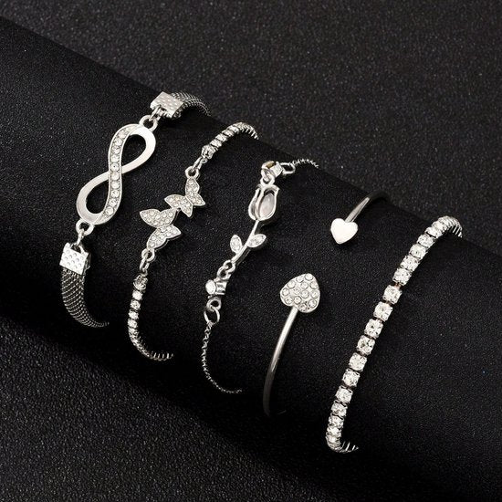 Sjika - 4 Delige Dames Armband Set Zilverkleurig – Infinity, Hart & Vlinder Armbanden – Strass Tennis Armband – Trendy Sieraden Set voor Dames - Cadeau voor haar