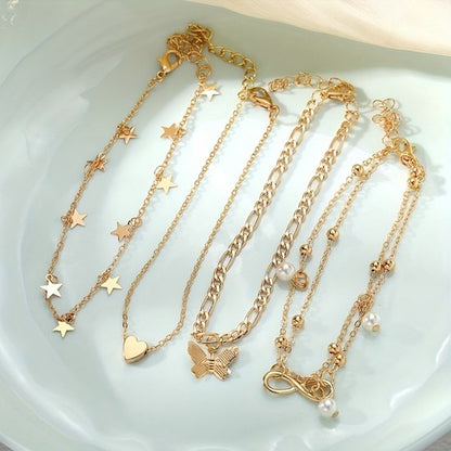 Sjika - Gouden Enkelbandjes Set Dames – 18K Gold Plated – Trendy Boho Style – Met Bedels & Parel Hangers – 5-delige Sieradenset