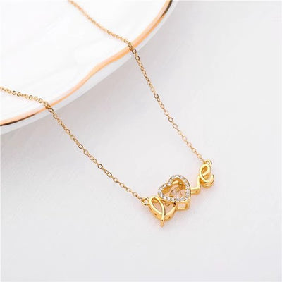 Sjika - Love Ketting Dames Goudkleurig – Hartjes Ketting met Strass Steentjes – Elegante Liefde Ketting – Trendy Dames Sieraden - Cadeau voor haar