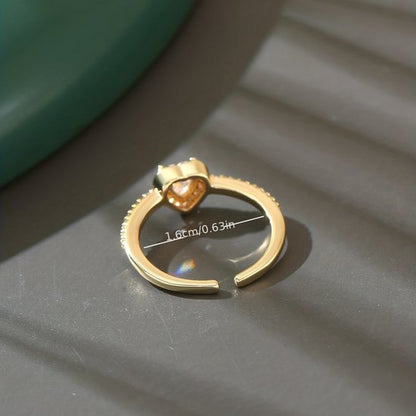Sjika - Gold plated ring met hartvormige zirkonia – Luxe damesring – elegant design – Perfect cadeau voor haar