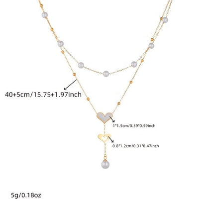 Sjika - Gold plated ketting met dubbele hart hanger & parels – Luxe damesketting – Elegant & romantisch design – Perfect cadeau voor haar