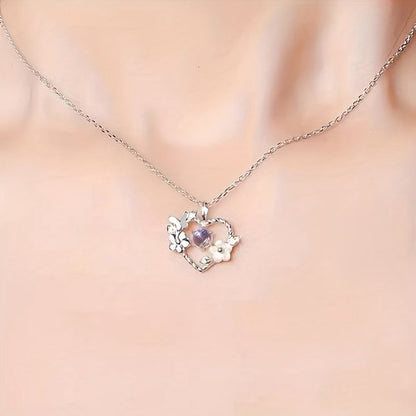 Sjika - Hart Ketting Dames Zilverkleurig – Vlinder & Bloem Hanger met Blauwe Kristal Steen – Elegante Dames Ketting – Romantisch Cadeau voor Haar