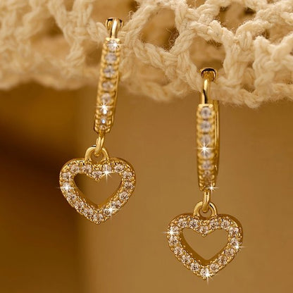 Sjika - Trendy hart oorbellen – Goudkleurige oorringen met steentjes – Perfect cadeau - Zirkonia - Voor haar