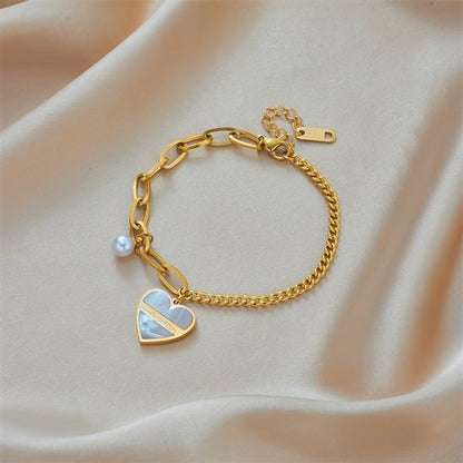 Sjika - Gouden Armband met Hart Hanger & Parel – Liefdes Armband – Verstelbaar – Luxe Dames Sieraad