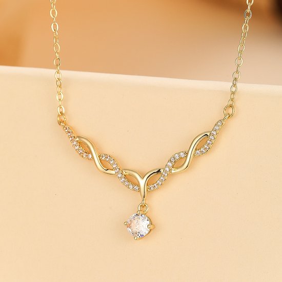 Sjika - Elegante 18k Goud Plated Ketting met Golvend Ontwerp en Zirkonia – Sprankelende Damesketting - Cadeau voor haar