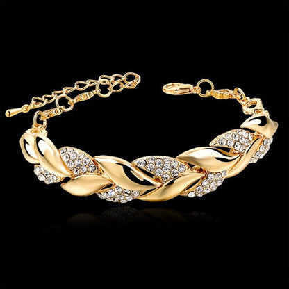 Sjika - Dames Armband Goudkleurig met Kristallen – Luxe Schakelarmband – Elegante Armband Dames – Trendy Sieraden - Cadeau van haar